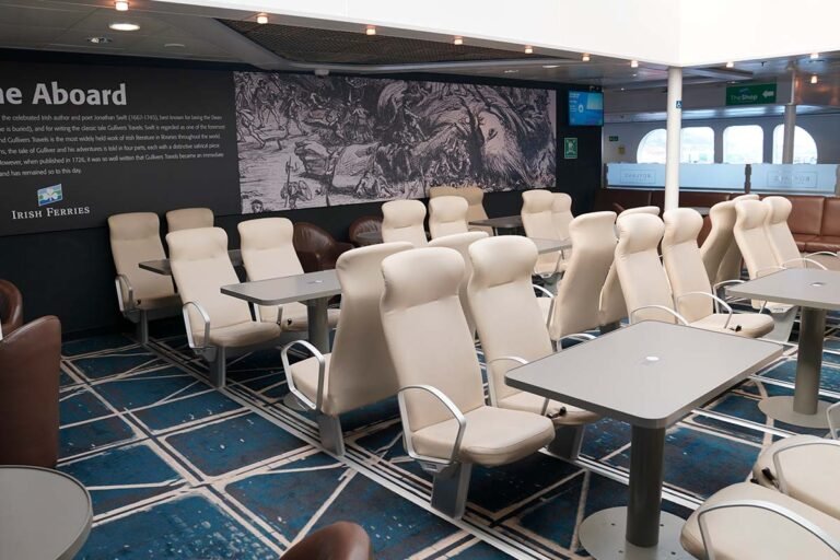 White chairs and tables on ferry mid deck