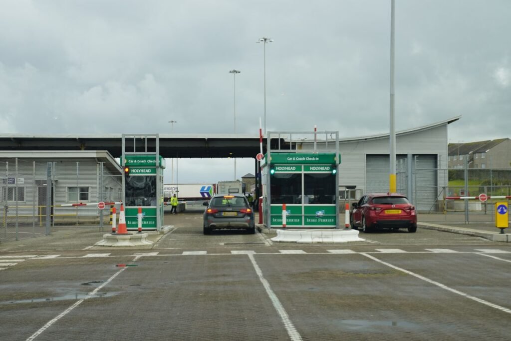 Cars driving through ferry check-in gate