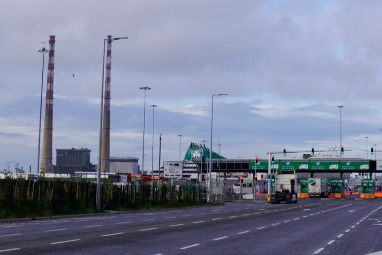 Dublin port with ferry and power station chimneys