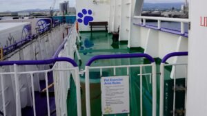 Pet area rules sign on ferry deck