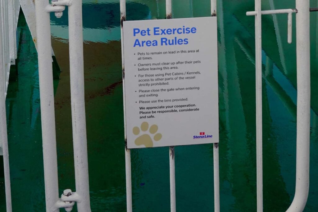 Pet area rules sign on ferry deck