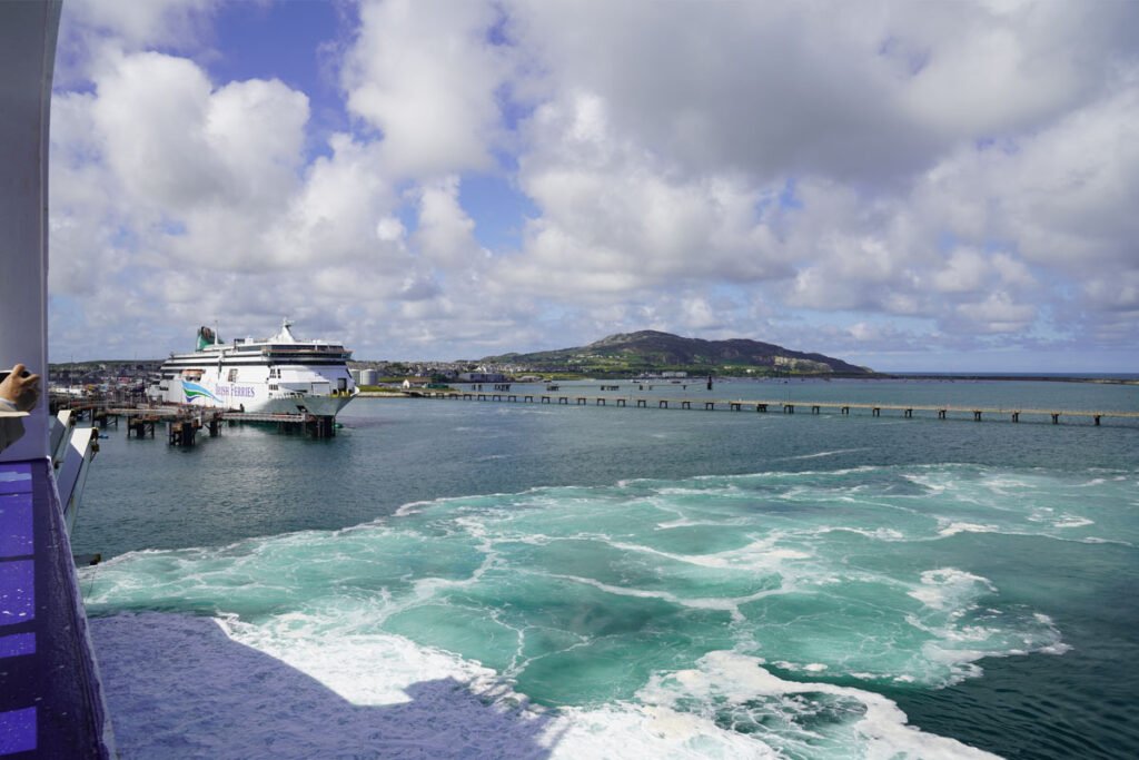 Ferry docking in Holyhead harbour beside another ship